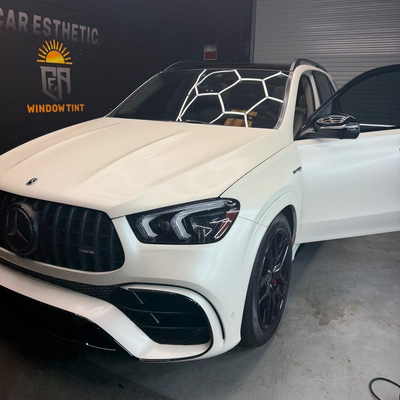 White Mercedes AMG GLE under the CEA logo